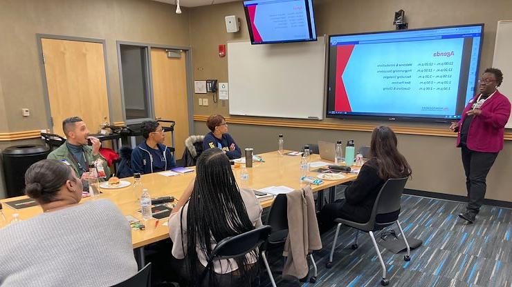 Angela Scott Ferencin, MCCC Student Support Programs Manager, discusses the Act 101 Scholars Program during a collaboration meeting with representatives from seven area two and four-year colleges and universities. Photo by Eric Devlin.